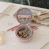 The Louenhide Sofia Jewelry Box is designed to hold and protect your most treasured pieces. Featuring a compact silhouette with two protective compartments, this multi-zipper case offers a streamlined way to store your jewellery without taking up unnecessary space. This travel jewellery case is the perfect addition to your bag, ensuring valuables stay secure and organised wherever the day leads.