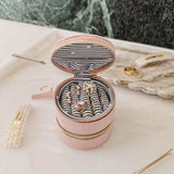 The Louenhide Sofia Jewelry Box is designed to hold and protect your most treasured pieces. Featuring a compact silhouette with two protective compartments, this multi-zipper case offers a streamlined way to store your jewellery without taking up unnecessary space. This travel jewellery case is the perfect addition to your bag, ensuring valuables stay secure and organised wherever the day leads.