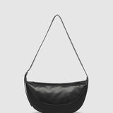 The Louenhide Stevie Crossbody Bag is your ultimate travel accessory. This on-trend crossbody bag is your go-to solution for keeping your essentials on hand while you explore new destinations or navigate your favourite city spots. From passports and travel documents to snacks, a water bottle, and even a small umbrella, this elevated everyday bag ensures you're prepared for any occasion. Look stylish and ensure comfort by adjusting the crossbody strap to your perfect position.