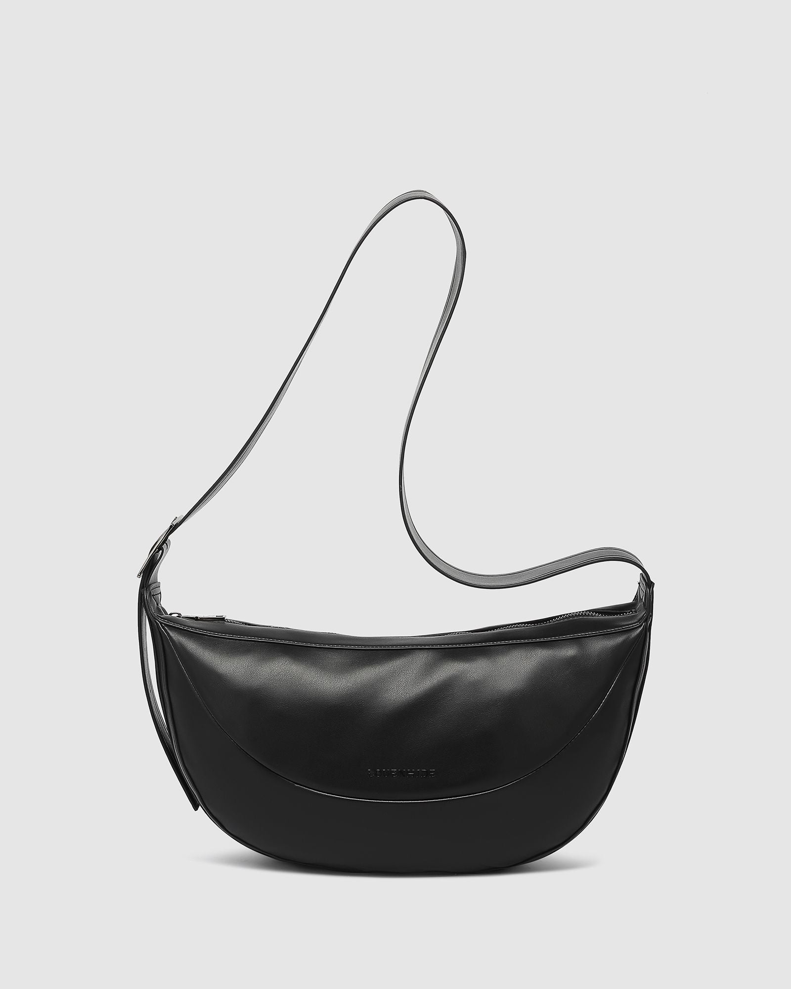 The Louenhide Stevie Crossbody Bag is your ultimate travel accessory. This on-trend crossbody bag is your go-to solution for keeping your essentials on hand while you explore new destinations or navigate your favourite city spots. From passports and travel documents to snacks, a water bottle, and even a small umbrella, this elevated everyday bag ensures you're prepared for any occasion. Look stylish and ensure comfort by adjusting the crossbody strap to your perfect position.