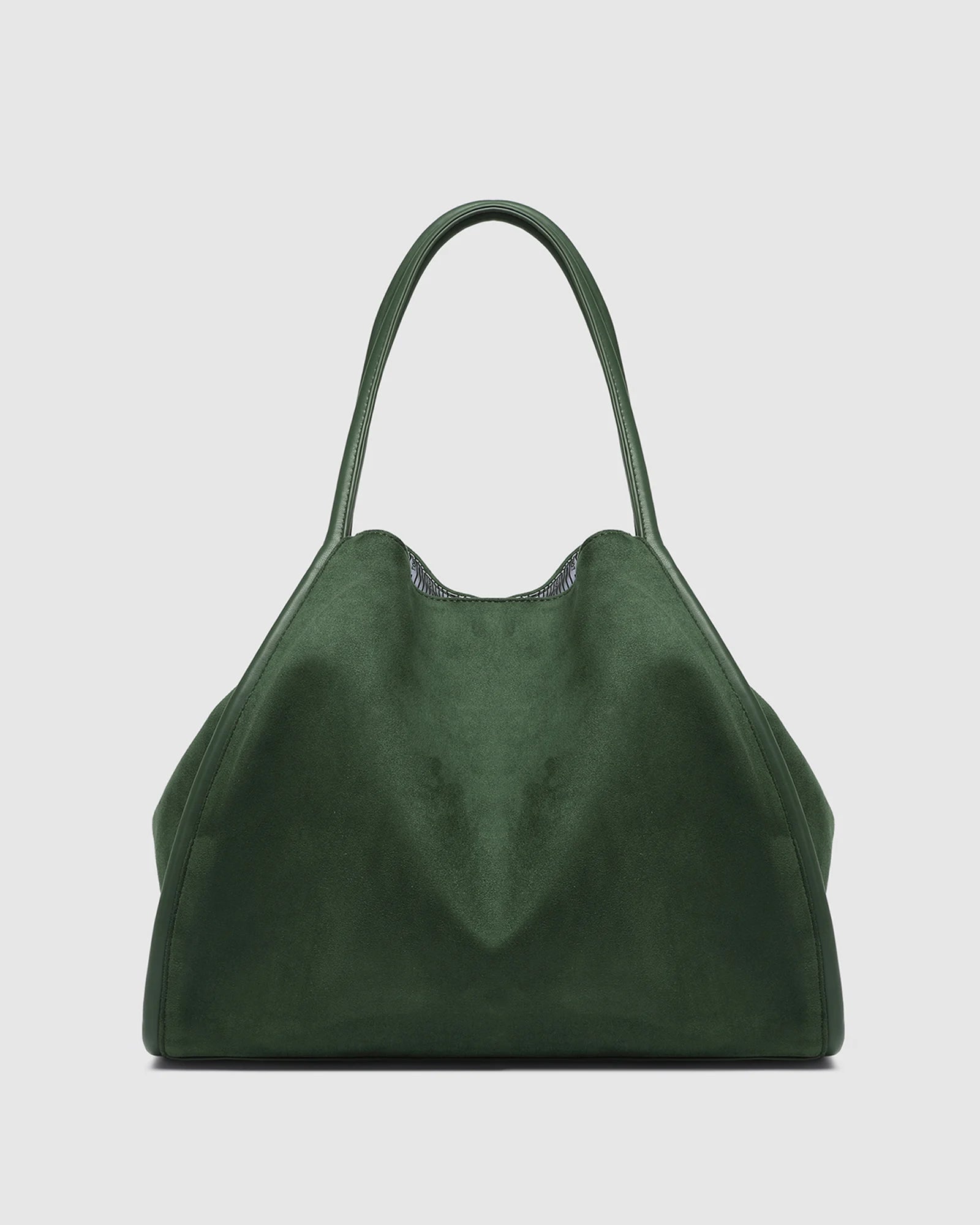 The Louenhide Sutton Shoulder Bag will compliment any everyday style with ease. Crafted with soft yet structured materials and accented by contrast top-stitch detailing, the Sutton is as practical as it is stylish.