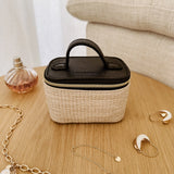 The Louenhide Trudy Jewelry Box is the perfect solution to keeping your valuables safely organized on the go. This compact travel jewelry case fits seamlessly into your luggage without taking up space. The secure zip closure ensures your jewelry stays protected, while the textured raffia and contrasting faux leather exterior add a touch of understated luxury to your travel style.