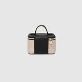 The Louenhide Trudy Jewelry Box is the perfect solution to keeping your valuables safely organized on the go. This compact travel jewelry case fits seamlessly into your luggage without taking up space. The secure zip closure ensures your jewelry stays protected, while the textured raffia and contrasting faux leather exterior add a touch of understated luxury to your travel style.