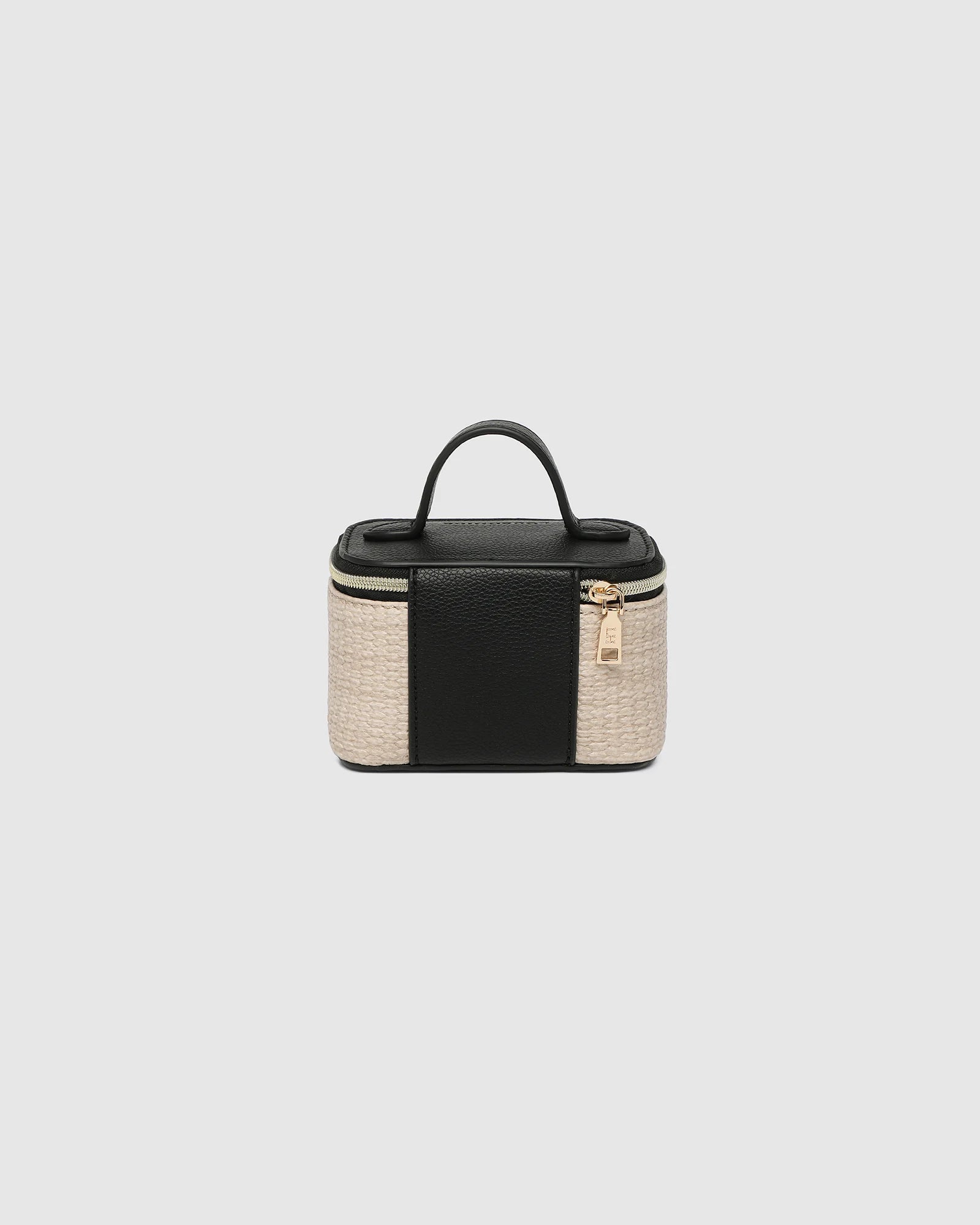 The Louenhide Trudy Jewelry Box is the perfect solution to keeping your valuables safely organized on the go. This compact travel jewelry case fits seamlessly into your luggage without taking up space. The secure zip closure ensures your jewelry stays protected, while the textured raffia and contrasting faux leather exterior add a touch of understated luxury to your travel style.
