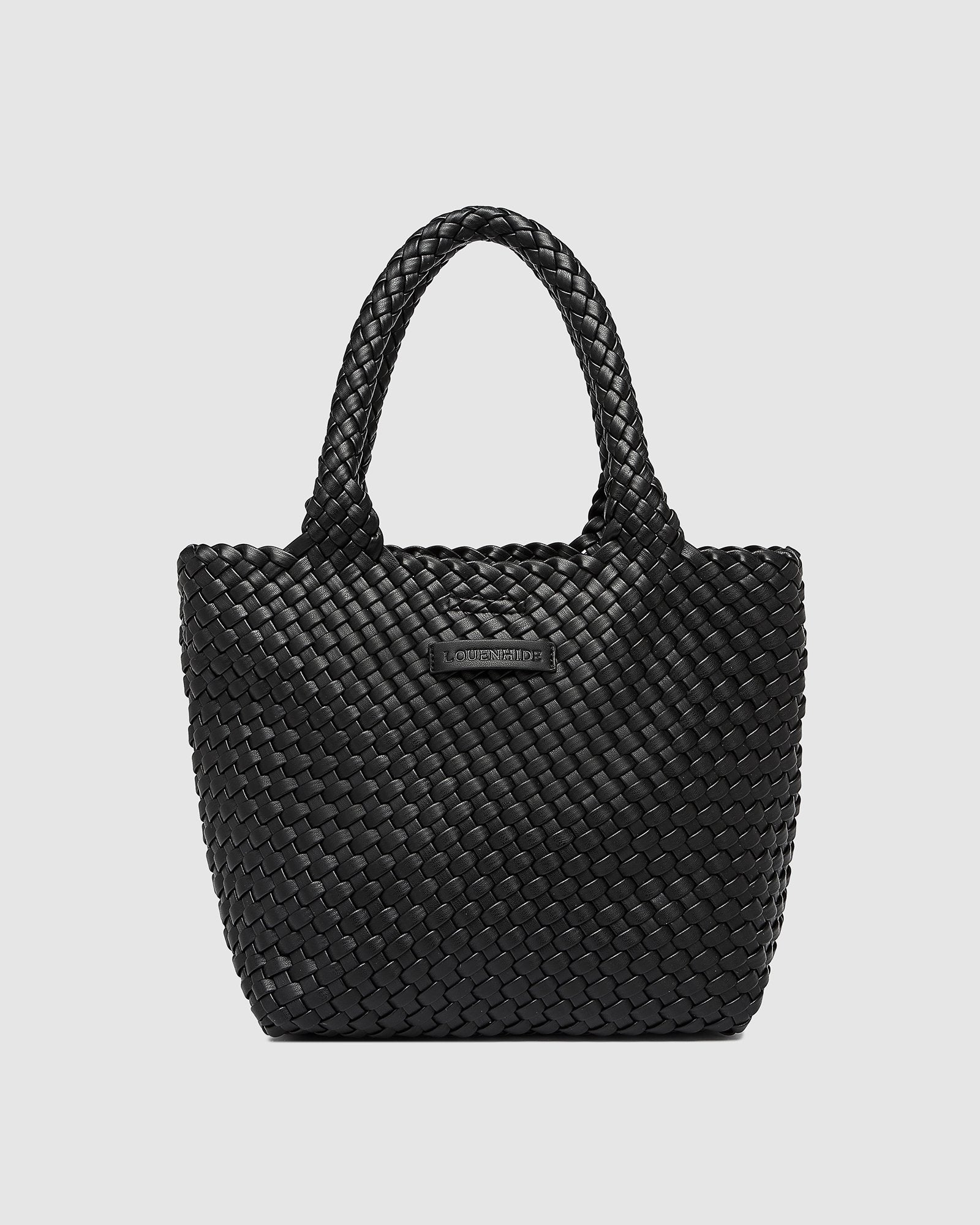 The Louenhide Baby Cruiser Woven Tote Bag is the epitome of laid-back elegance. Following on the woven trend, this women's woven tote bag will add the perfect touch of texture to your capsule wardrobe. Simply carry by the comfortable top handles or attach the adjustable crossbody strap for a hands-free moment when strolling around town. Elevate your style and carry your essentials with the Baby Cruiser Malt Woven Tote Bag.