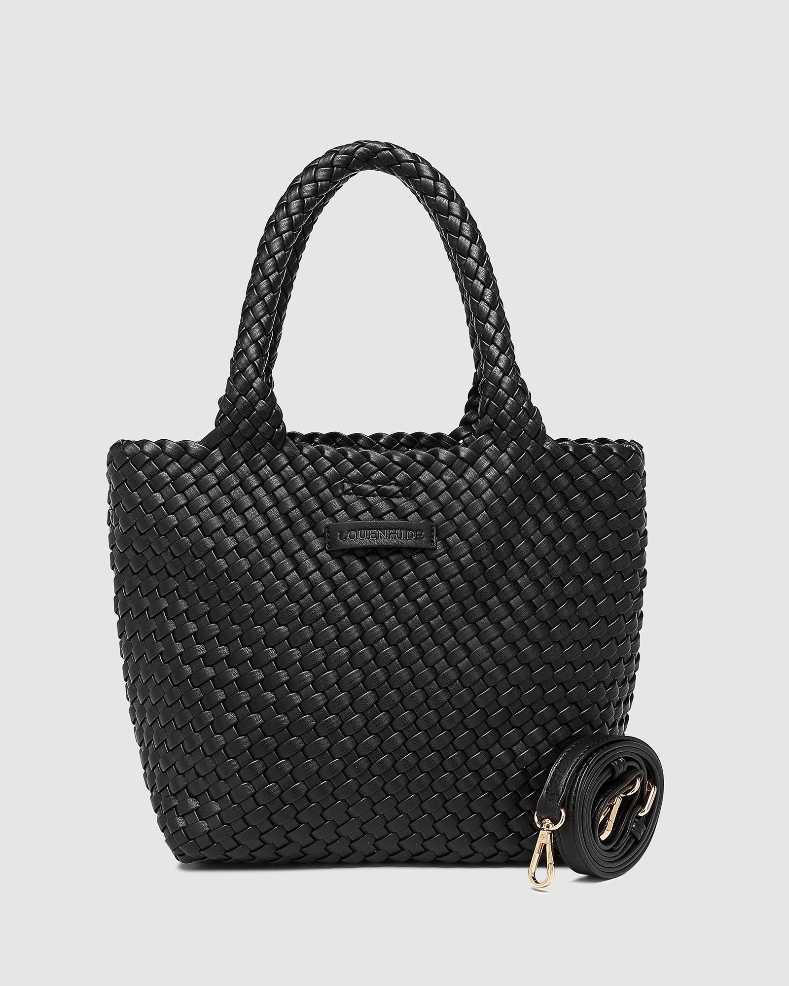 The Louenhide Baby Cruiser Woven Tote Bag is the epitome of laid-back elegance. Following on the woven trend, this women's woven tote bag will add the perfect touch of texture to your capsule wardrobe. Simply carry by the comfortable top handles or attach the adjustable crossbody strap for a hands-free moment when strolling around town. Elevate your style and carry your essentials with the Baby Cruiser Malt Woven Tote Bag.