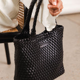 The Louenhide Baby Cruiser Woven Tote Bag is the epitome of laid-back elegance. Following on the woven trend, this women's woven tote bag will add the perfect touch of texture to your capsule wardrobe. Simply carry by the comfortable top handles or attach the adjustable crossbody strap for a hands-free moment when strolling around town. Elevate your style and carry your essentials with the Baby Cruiser Malt Woven Tote Bag.