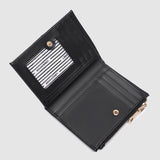 The Louenhide Blondie Wallet is the perfect everyday accessory to keep your cards, bills and coins all in one place. Say goodbye to bulky wallets and hello to a slim streamlined women's coin purse that effortlessly fits in your pocket or favourite Louenhide bag. If you prefer a minimalistic look this sleek card holder is the perfect fit for you.