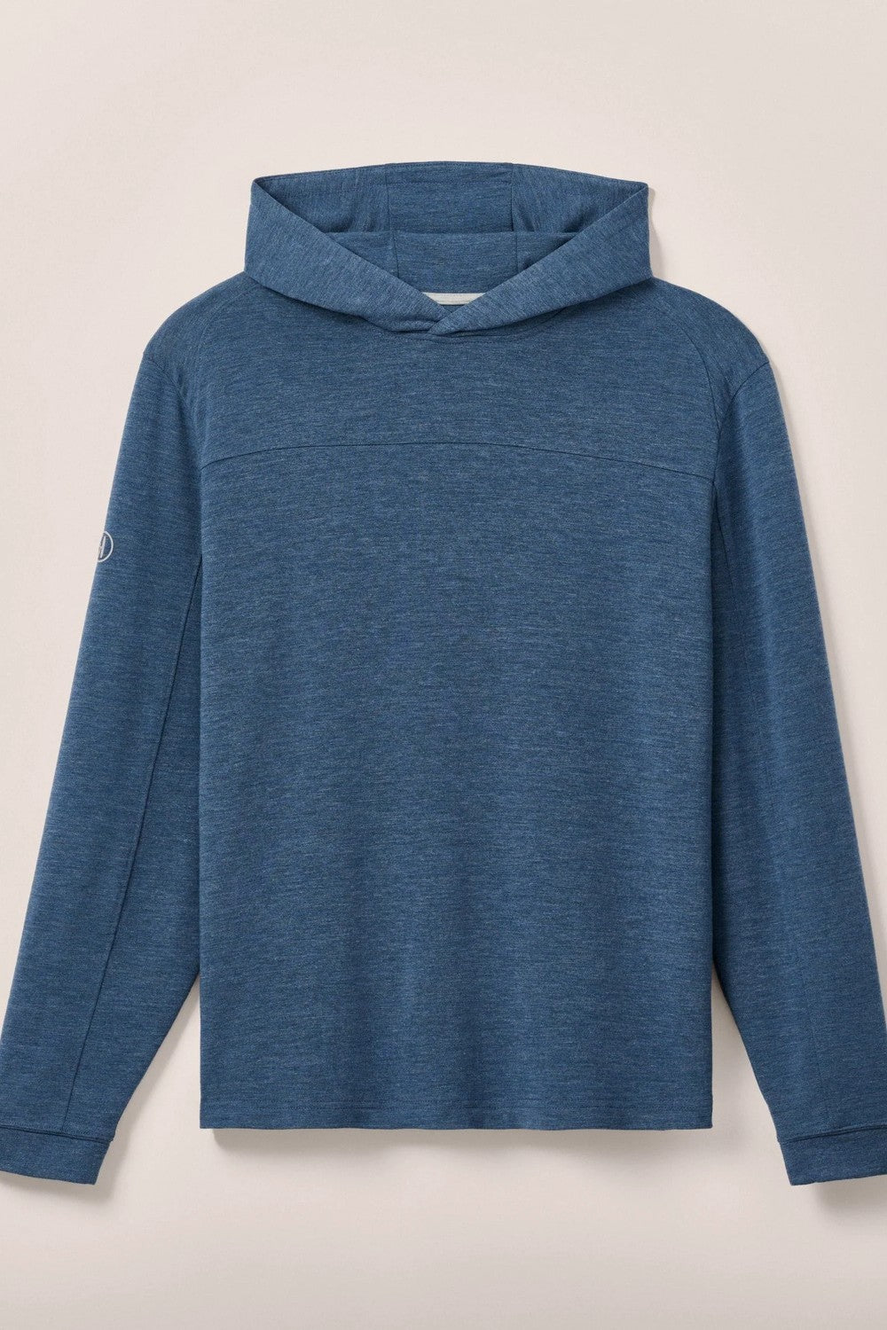 Blue hoodie on a light beige background