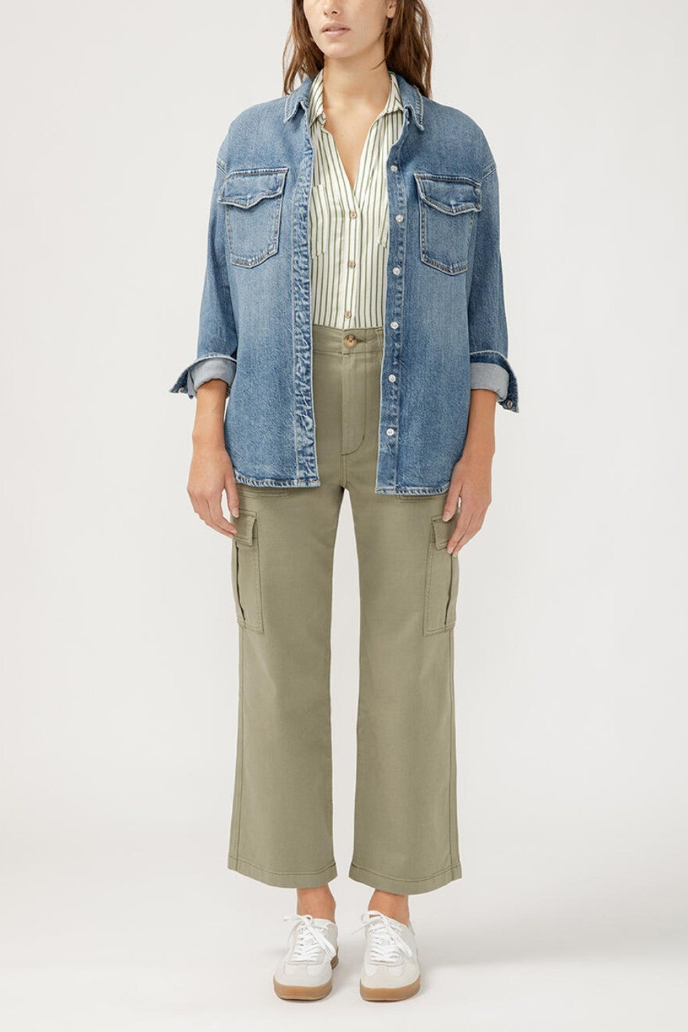The perfect layer for any season? A denim shacket. This stylish top layer combines the structure of a jacket with the ease of a shirt, featuring a relaxed fit and oversized pockets. Wear it open or buttoned up, dressed up or down—this jean shacket is sure to be your new staple layer.