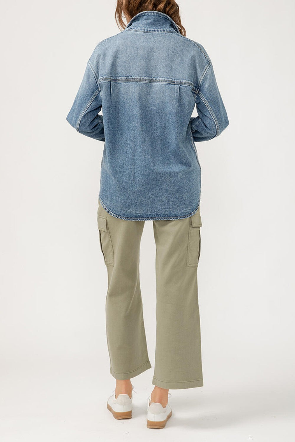 The perfect layer for any season? A denim shacket. This stylish top layer combines the structure of a jacket with the ease of a shirt, featuring a relaxed fit and oversized pockets. Wear it open or buttoned up, dressed up or down—this jean shacket is sure to be your new staple layer.