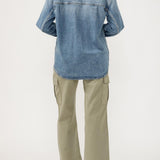 The perfect layer for any season? A denim shacket. This stylish top layer combines the structure of a jacket with the ease of a shirt, featuring a relaxed fit and oversized pockets. Wear it open or buttoned up, dressed up or down—this jean shacket is sure to be your new staple layer.