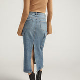 Meet your staple denim skirt for spring and beyond. Our medium wash midi cargo skirt is the perfect statement piece, dressed up or down. With side cargo pockets and a back slit, this is a skirt you'll love wearing everywhere.