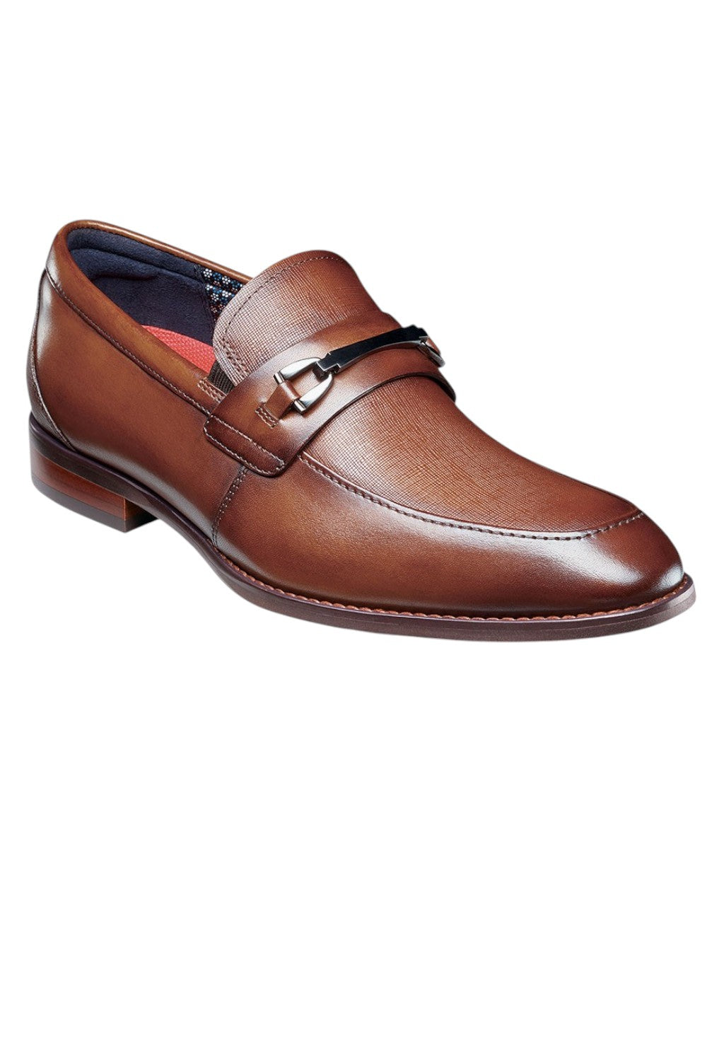 The Stacy Adams Kaylor Moc Toe Bit Slip On features a stylish upper and stacked heel. Highlighted by a stylish metal bit, it also has the comfort of breathable linings and our RedZone cushioned footbed. This slip on style is versatile enough for work, night out, or special event.