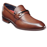 The Stacy Adams Kaylor Moc Toe Bit Slip On features a stylish upper and stacked heel. Highlighted by a stylish metal bit, it also has the comfort of breathable linings and our RedZone cushioned footbed. This slip on style is versatile enough for work, night out, or special event.