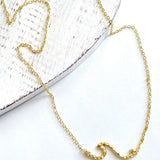 Ride the wave with this Chainlink Necklace featuring a handmade wave pendant. Gold plated for a delicate touch, this necklace is perfect for any occasion.