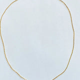 Ride the wave with this Chainlink Necklace featuring a handmade wave pendant. Gold plated for a delicate touch, this necklace is perfect for any occasion.