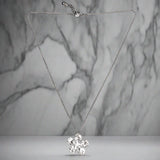 Add a touch of whimsy to your wardrobe with our Hammered Flower Pendant On Chain. Each silver plated pendant features a unique floral design, making it the perfect accessory for any outfit.