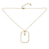 This elegant and contemporary hammered rectangle pendant in gold plate features a beautiful pearl, adding a touch of sophistication to any outfit. Embrace a timeless and refined look with this stunning piece.