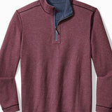 Maroon pullover with blue collar on a white background
