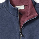 Blue pullover with maroon interior collar and Tommy Bahama label.