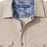 Beige shirt with blue floral lining and Tommy Bahama logo