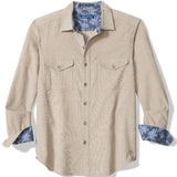 Beige button-up shirt with blue cuffs and collar on a white background