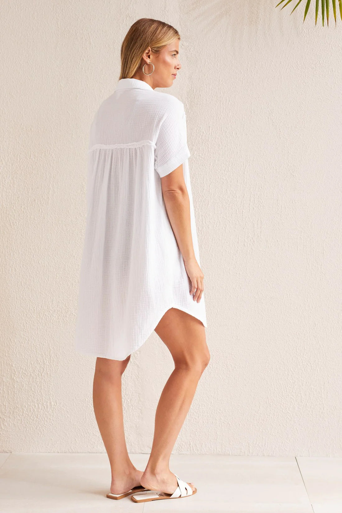Elevate your sunny day style with this shirt dress made from crinkled gauze fabric that's lightweight and flowy.