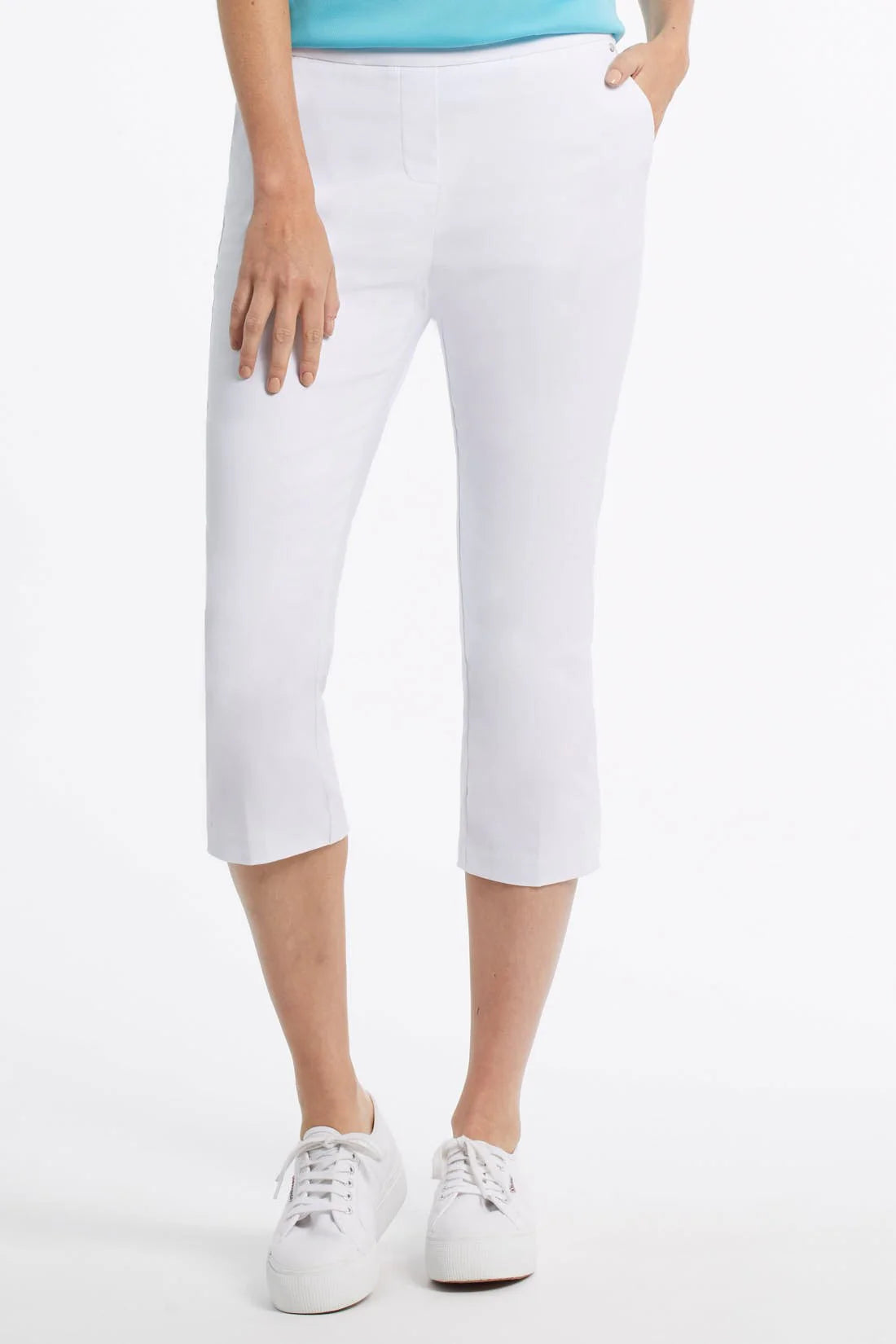 There's a reason these chic capris are one of our best-selling pieces--from the tummy slimming FLATTEN IT® technology to the pull-on waist, signature Century Stretch twill fabric and pocket details. These ultra-flattering 22" pants are made to take you through your day, or night, in comfort and style.