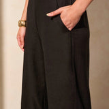 Crafted from a breathable linen-blend weave and designed with a stylish hem vent detail, these wide-leg ankle pants are a go-to favourite for warm weather. An elastic back waistband provides a comfortable fit, while handy front pockets offer convenient storage for your daily necessities.