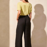 Crafted from a breathable linen-blend weave and designed with a stylish hem vent detail, these wide-leg ankle pants are a go-to favourite for warm weather. An elastic back waistband provides a comfortable fit, while handy front pockets offer convenient storage for your daily necessities.