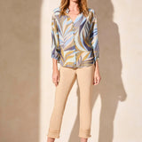 Refresh your wardrobe with this button-front blouse, featuring a vibrant print and textured woven fabric for a luxurious feel. Three-quarter-length sleeves provide ideal coverage, with elastic cuffs that make rolling a breeze. A ruffle detail at the collar adds a subtle touch of finesse.