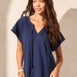Infuse your look with effortless boho charm in this short-sleeve top, featuring a notch neckline with tassel-tipped ties. Made from soft cotton slub knit, it offers a breathable, comfortable feel. A contour band accentuates the neckline, while braided edge trim adds a refined touch to the design.