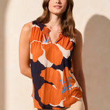 Stay cool and chic on warm days with this breezy sleeveless top, made from a breathable linen-blend knit. The smocked detail adds flattering structure to the elegant notch neckline, while the bold floral print infuses your look with vibrant color and fresh energy.