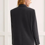 We love combining timeless pieces with trendy embellishments, and this double-breasted blazer showcases that flawlessly. 