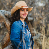 Whether exploring the Southwest or lounging at the beach, this artsy cowboy sun hat will be your new summer favourite. The wire-edged brim makes it easily moldable to your exact style. A faux suede leather and colourful beaded band makes it interesting.