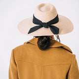 Inspired by the timeless romance movie, “Somewhere in Time,” starring Jane Seymour, this impressive hat has a sweeping brim for enchanting walks by the sea. Sun protection at its finest.