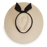Inspired by the timeless romance movie, “Somewhere in Time,” starring Jane Seymour, this impressive hat has a sweeping brim for enchanting walks by the sea. Sun protection at its finest.