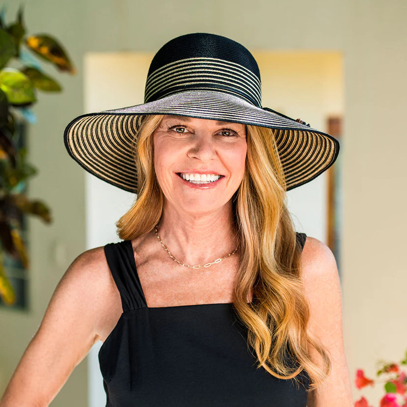 Stripes are always in style. From the beach to the runway, this hat adds a touch of class to any event. Flexi-Weave fabric keeps it looking great.