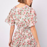 Boasting a mood-boosting watercolour floral print, this mini dress is a must-have for warm days. Crafted from floaty chiffon and lined for comfort, it features a flattering smocked waist, a V-neckline with button-down bodice, and a ruffle-tiered skirt to create movement. Simply style with sandals to complete the look.