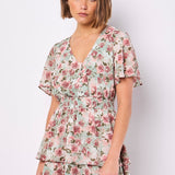 Boasting a mood-boosting watercolour floral print, this mini dress is a must-have for warm days. Crafted from floaty chiffon and lined for comfort, it features a flattering smocked waist, a V-neckline with button-down bodice, and a ruffle-tiered skirt to create movement. Simply style with sandals to complete the look.