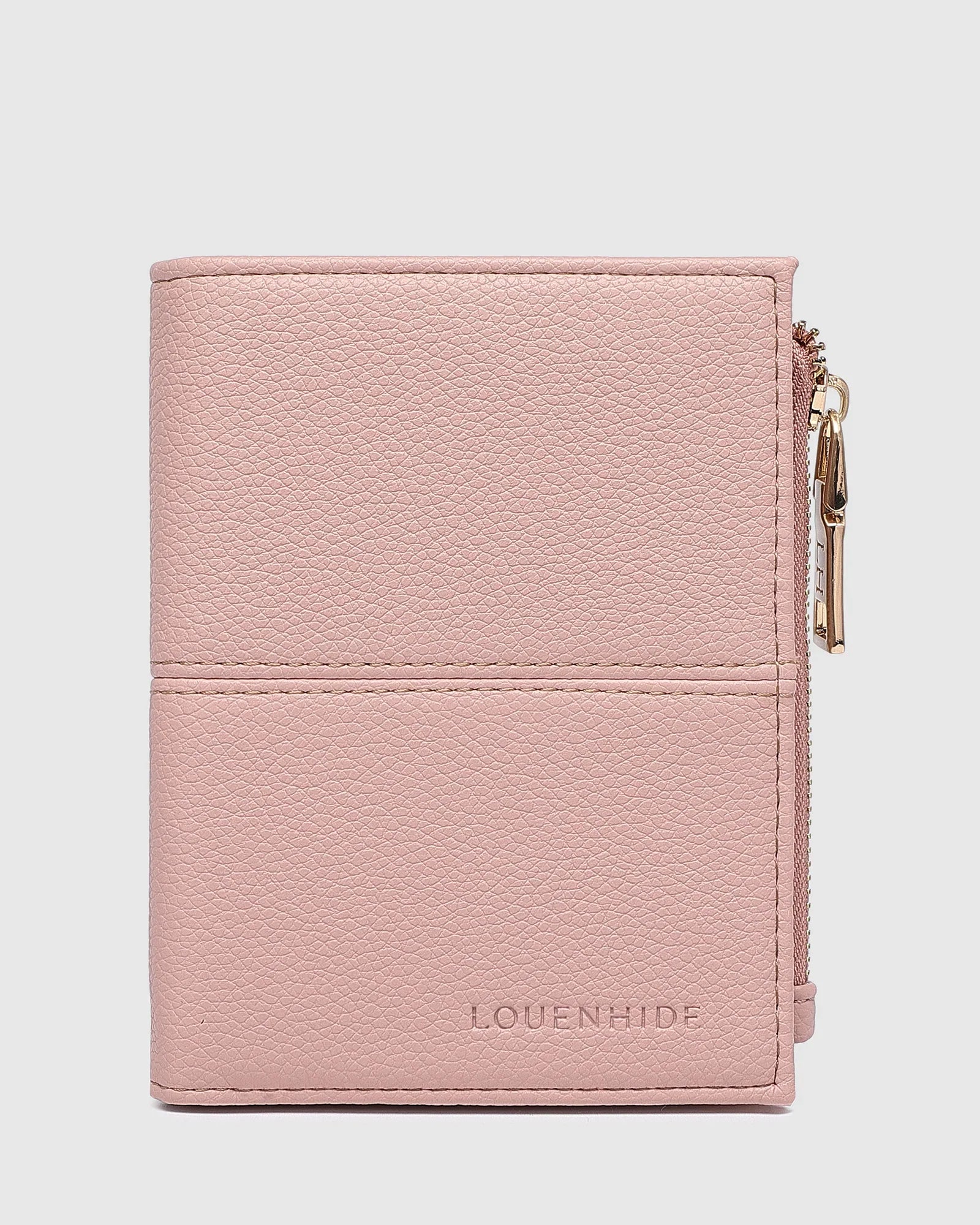 The Louenhide Blondie Wallet is the perfect everyday accessory to keep your cards, bills and coins all in one place. Say goodbye to bulky wallets and hello to a slim streamlined women's coin purse that effortlessly fits in your pocket or favourite Louenhide bag. If you prefer a minimalistic look this sleek card holder is the perfect fit for you.