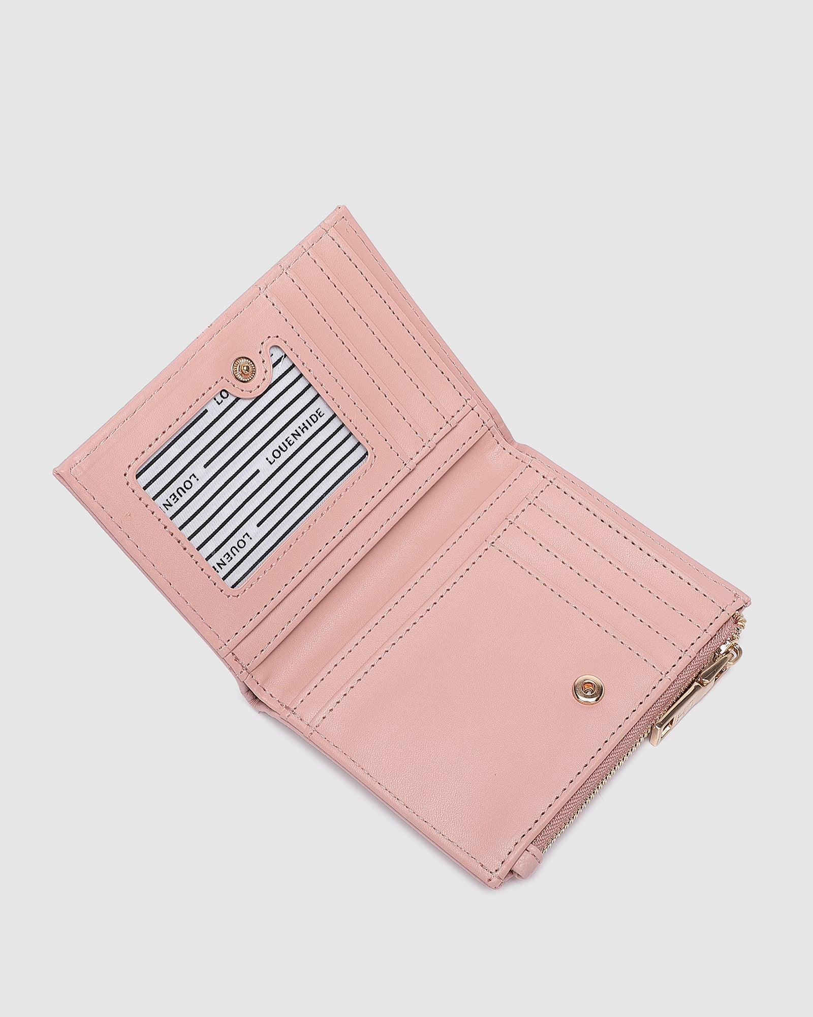 The Louenhide Blondie Wallet is the perfect everyday accessory to keep your cards, bills and coins all in one place. Say goodbye to bulky wallets and hello to a slim streamlined women's coin purse that effortlessly fits in your pocket or favourite Louenhide bag. If you prefer a minimalistic look this sleek card holder is the perfect fit for you.