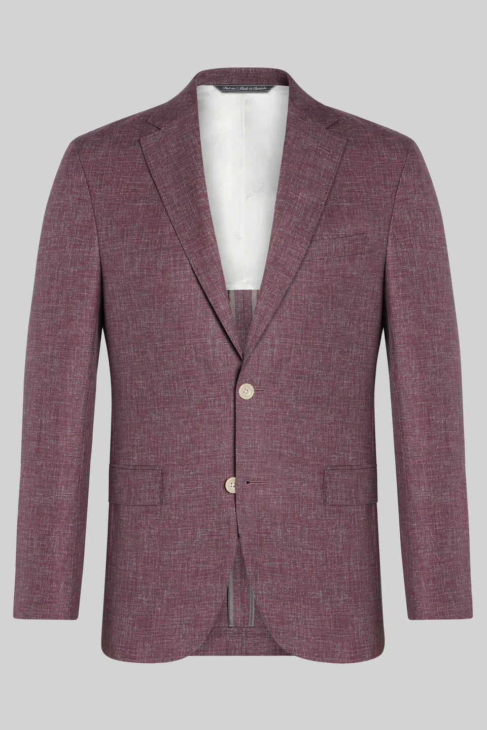 This Midland solid berry blazer is crafted from supersoft and light wool woven in Italy. This fabric allows the wearer to enjoy a crease free linen look thanks to the different colors of yarns used in this 100% worsted wool fabric.