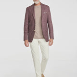 This Midland solid berry blazer is crafted from supersoft and light wool woven in Italy. This fabric allows the wearer to enjoy a crease free linen look thanks to the different colors of yarns used in this 100% worsted wool fabric.