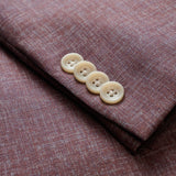 This Midland solid berry blazer is crafted from supersoft and light wool woven in Italy. This fabric allows the wearer to enjoy a crease free linen look thanks to the different colors of yarns used in this 100% worsted wool fabric.