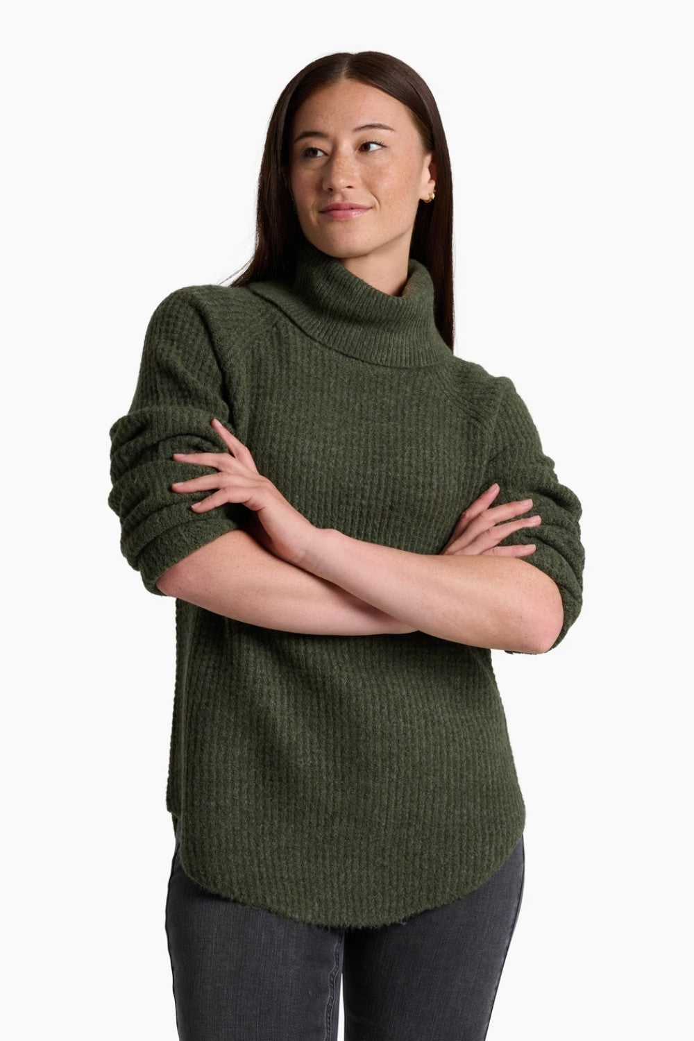 Woman wearing a green sweater with a white background