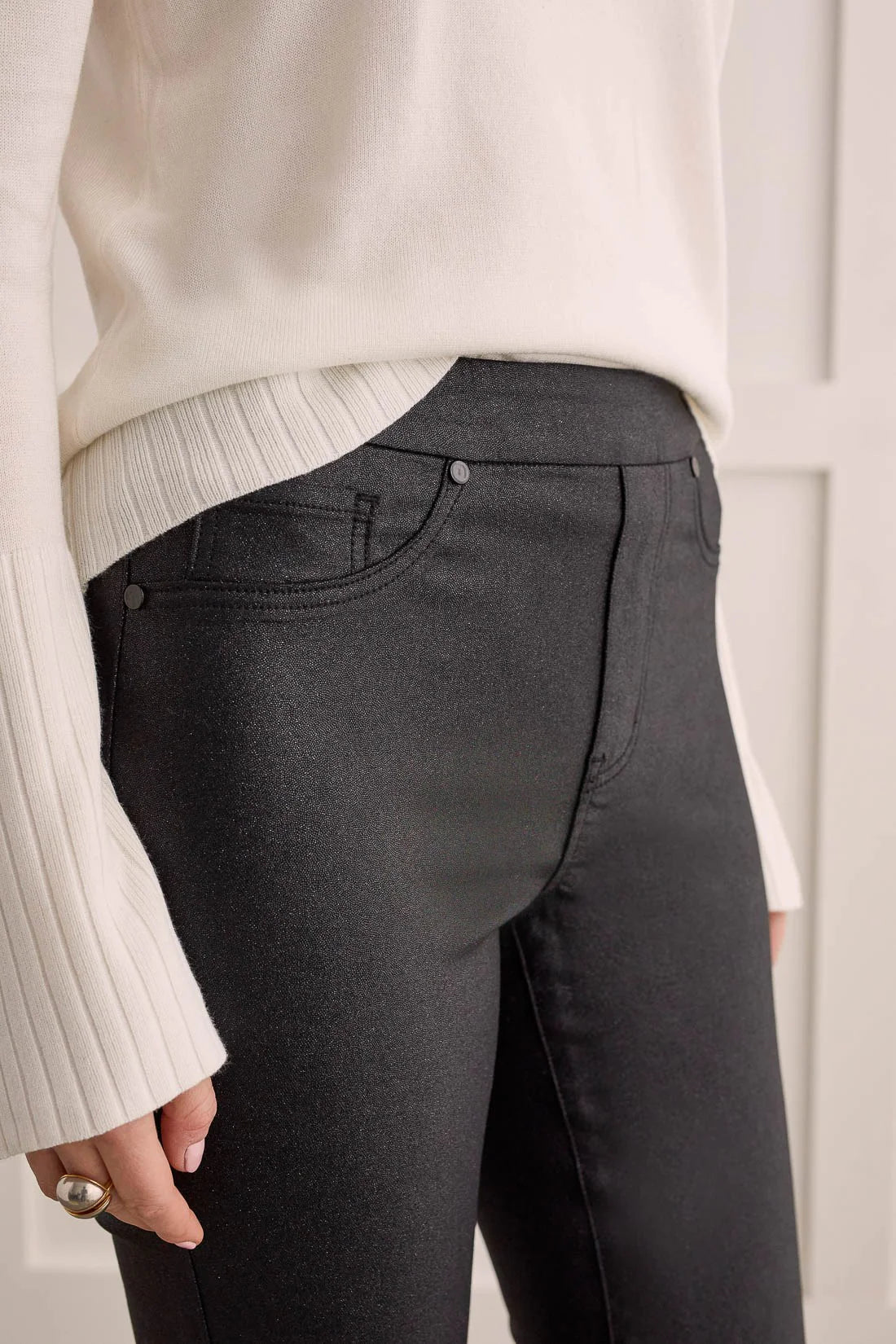 We're obsessed with the way these glitter-coated skinny pants wrap you in flashy style—they're perfect for bringing a dressy, pulled-together feel to even the most casual outfits.