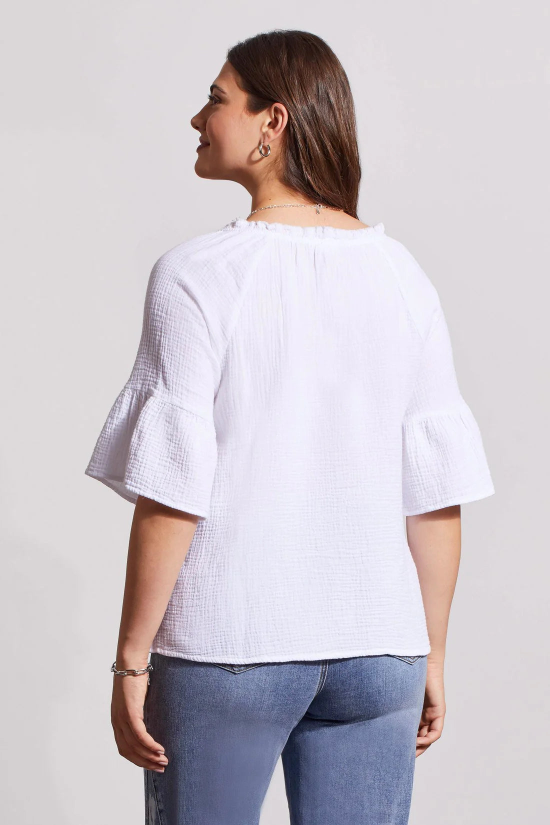 Crafted from crinkled gauze cotton, this blouse brings a lightweight feel and refined look to your regular rotation.