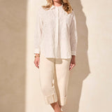 Exquisite embroidered eyelet details enhance the elegance of this classic button-front shirt. The timeless collar frames your face with refined charm, while long sleeves offer comfortable coverage. Crafted from woven cotton fabric, it ensures a breathable feel.